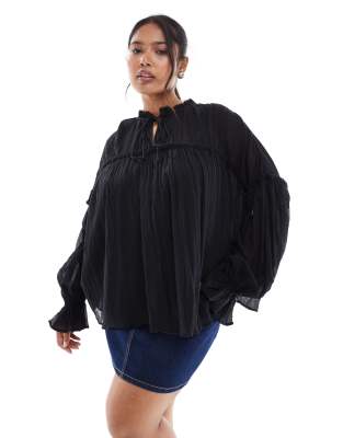 ASOS DESIGN Curve tie neck ruffle detail crinkle long sleeve smock top in black - view 1