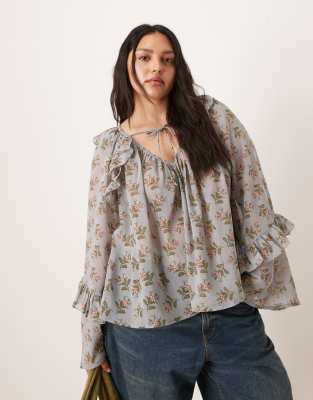 ASOS DESIGN Curve tie neck smock top with flared sleeves in floral print-Multi