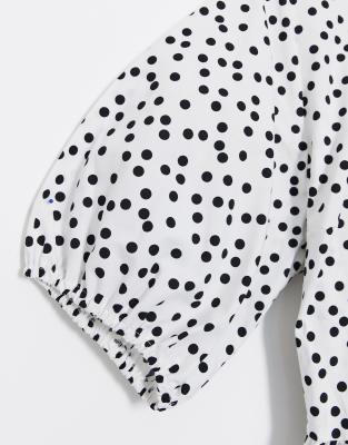 white dress with black spots