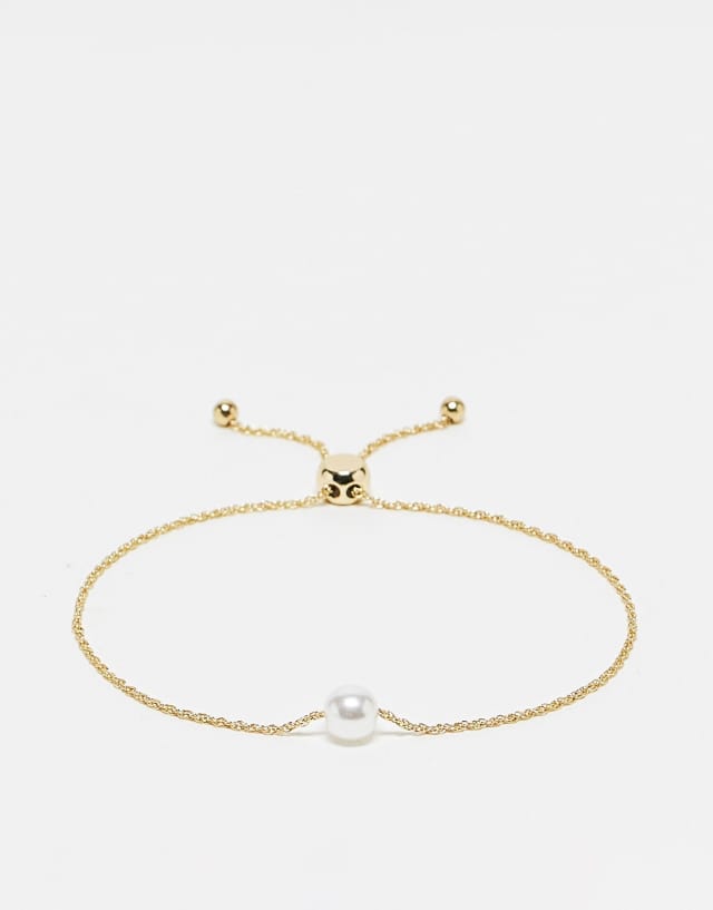 ASOS DESIGN Curve toggle bracelet with pearl detail in gold tone