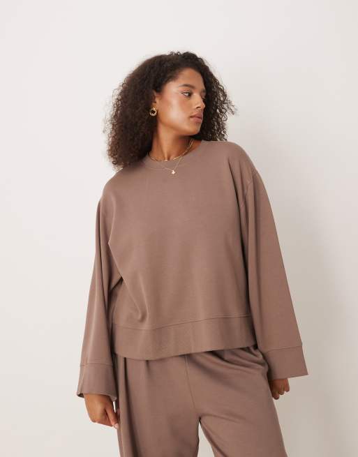 ASOS DESIGN Curve - Top oversize girocollo color talpa intenso in tessuto interlock