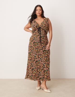 ASOS DESIGN Curve - Trägerkleid mit Blumenmuster, V-Ausschnitt und Bindedetail unter der Brust-Bunt