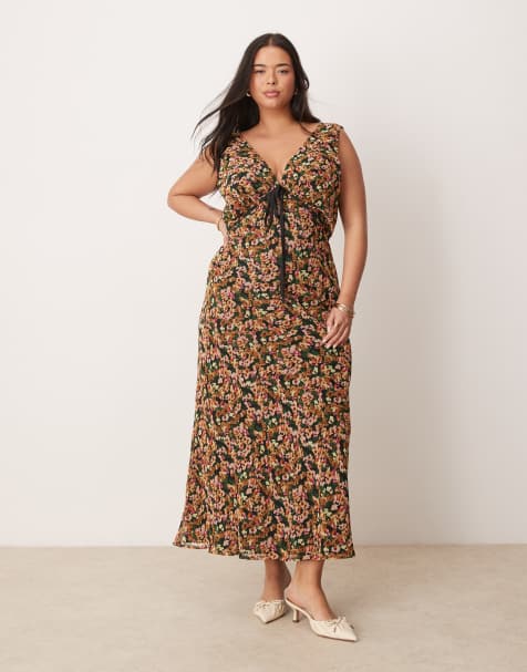ASOS DESIGN Curve – Trägerkleid mit Blumenmuster, V-Ausschnitt und Bindedetail unter der Brust - view 1