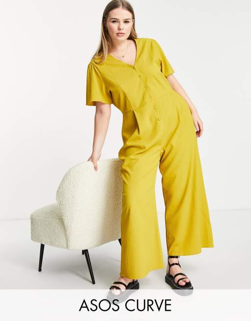 ASOS DESIGN Curve - Tuta jumpsuit da giorno a maniche corte con pantaloni culotte color senape
