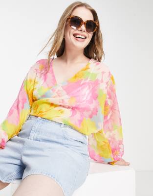 ASOS DESIGN Curve twist plunge top in bright floral print