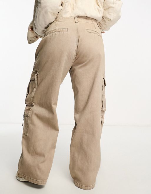 ASOS DESIGN ultra flare cargo pants in khaki sulphur wash