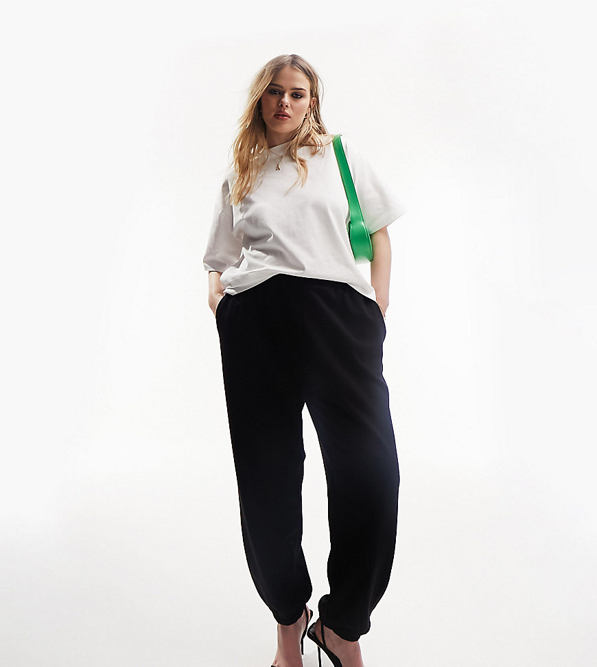 Curve %26 Plus Size by ASOS Curve Act casual Elasticated waistband Side pockets Fitted cuffs Regular tapered fit