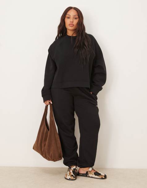 ASOS DESIGN Curve – Ultimate – Jogginghose in Schwarz mit weicher Innenseite und Bündchen - view 1