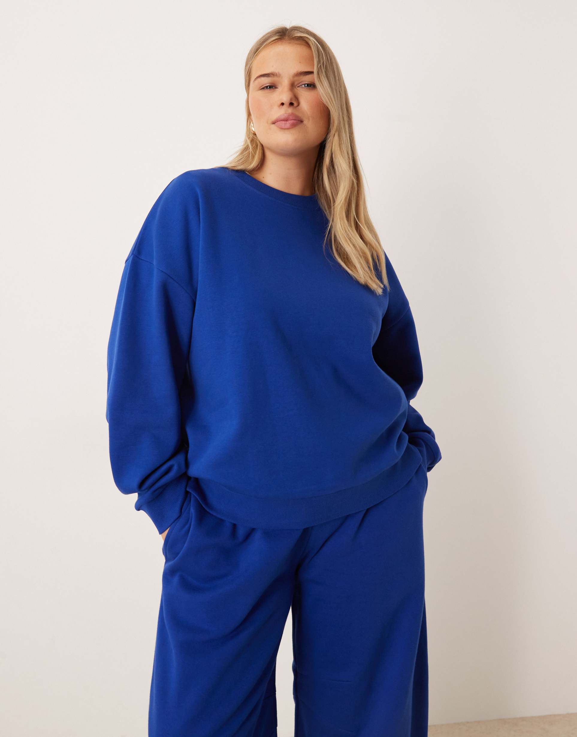 asos design curve ultimate oversized brushback sweatshirt in deep blue