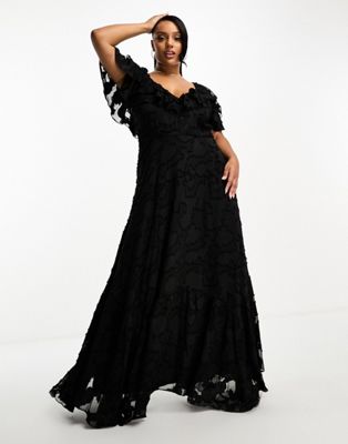 ASOS DESIGN Curve v front v back ruffle maxi dress with flutter sleeve and tie back in textured burnout in black