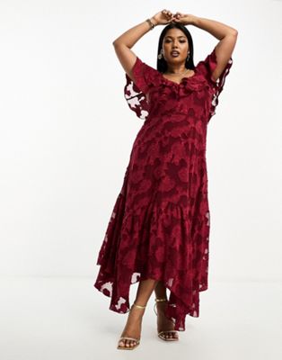 ASOS DESIGN Curve v front v back ruffle midi dress with flutter sleeve and tie back in textured burnout in burgundy