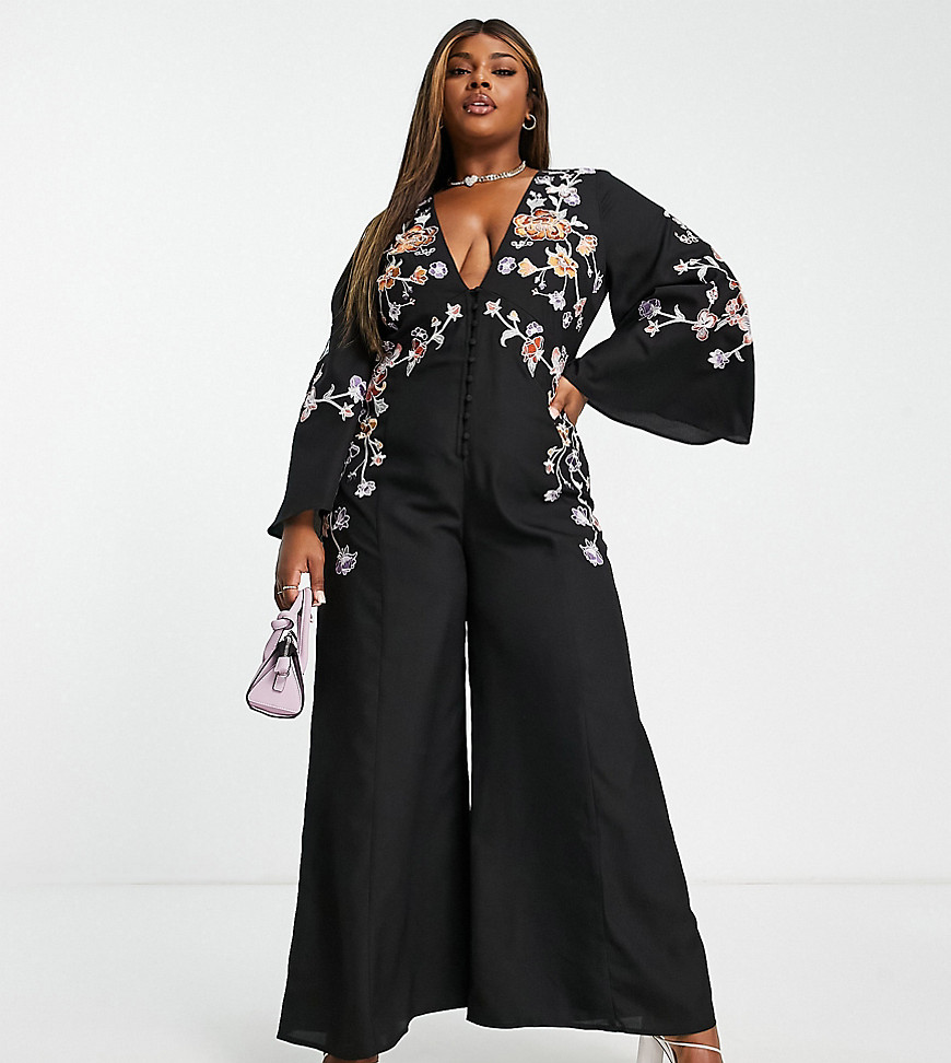 ASOS DESIGN Curve V neck button through jumpsuit with flared sleeves and embroidery in black