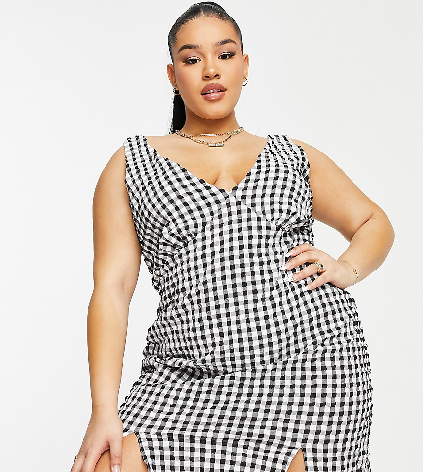 Plus-size dress by ASOS DESIGN Check you out V-neck front and back Notches to hem Mini length Regular fit