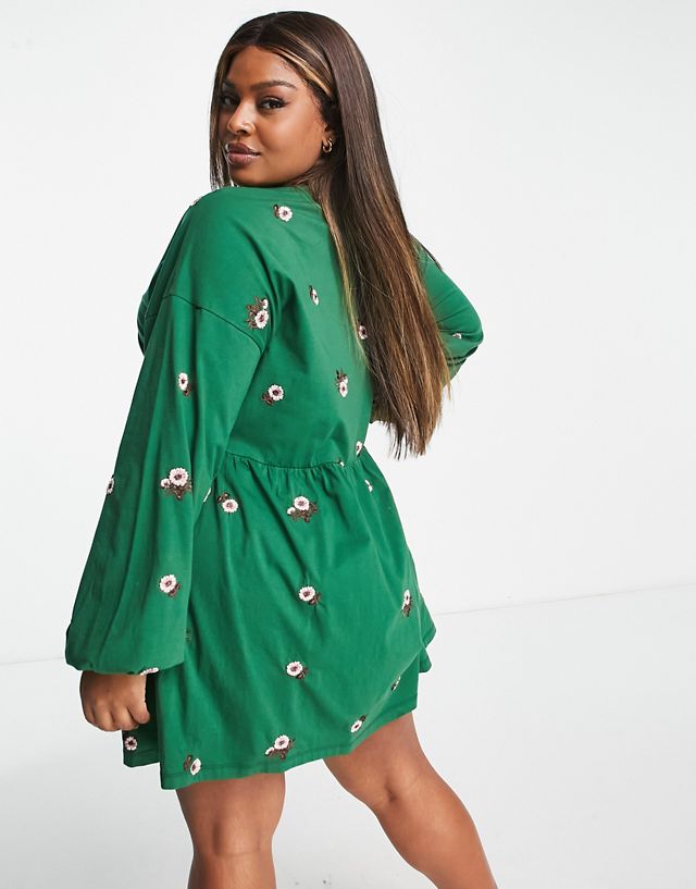ASOS DESIGN Curve v neck smock mini dress with all over daisy embroidery in forest green PB12095