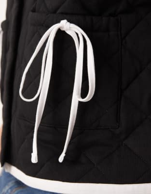 Asos Curve Asos Design Curve Vest With Quilted Contrast Binding Design And Bow Pocket Detail In Black