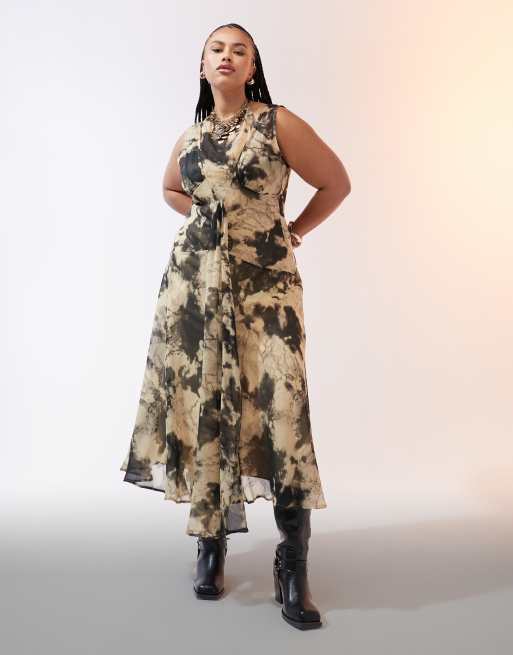 ASOS DESIGN Curve - Vestito allacciato al collo a doppio strato color senape con stampa astratta