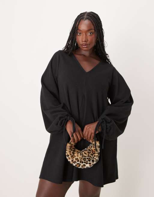 ASOS DESIGN Curve - Vestito corto ultra morbido nero con maniche allacciate, fondo svasato e scollo a V