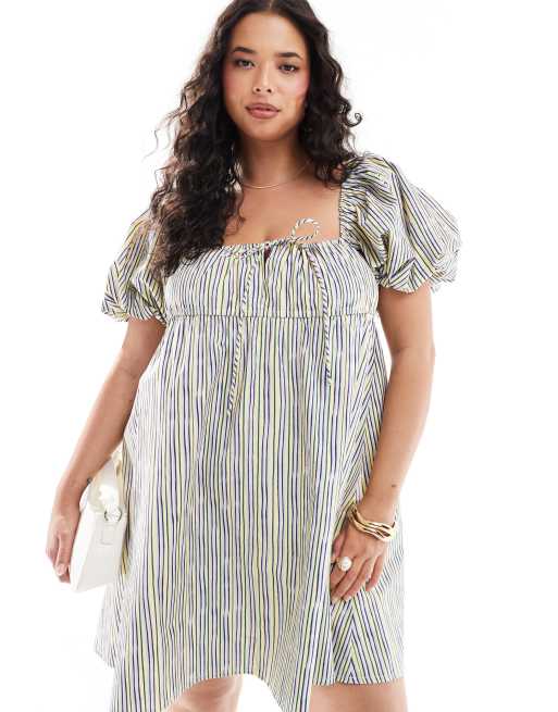 ASOS DESIGN Curve - Vestito grembiule corto giallo a righe con maniche a sbuffo 