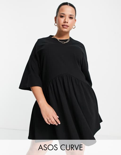 ASOS DESIGN Curve - Vestito grembiule corto oversize con vita scesa nero