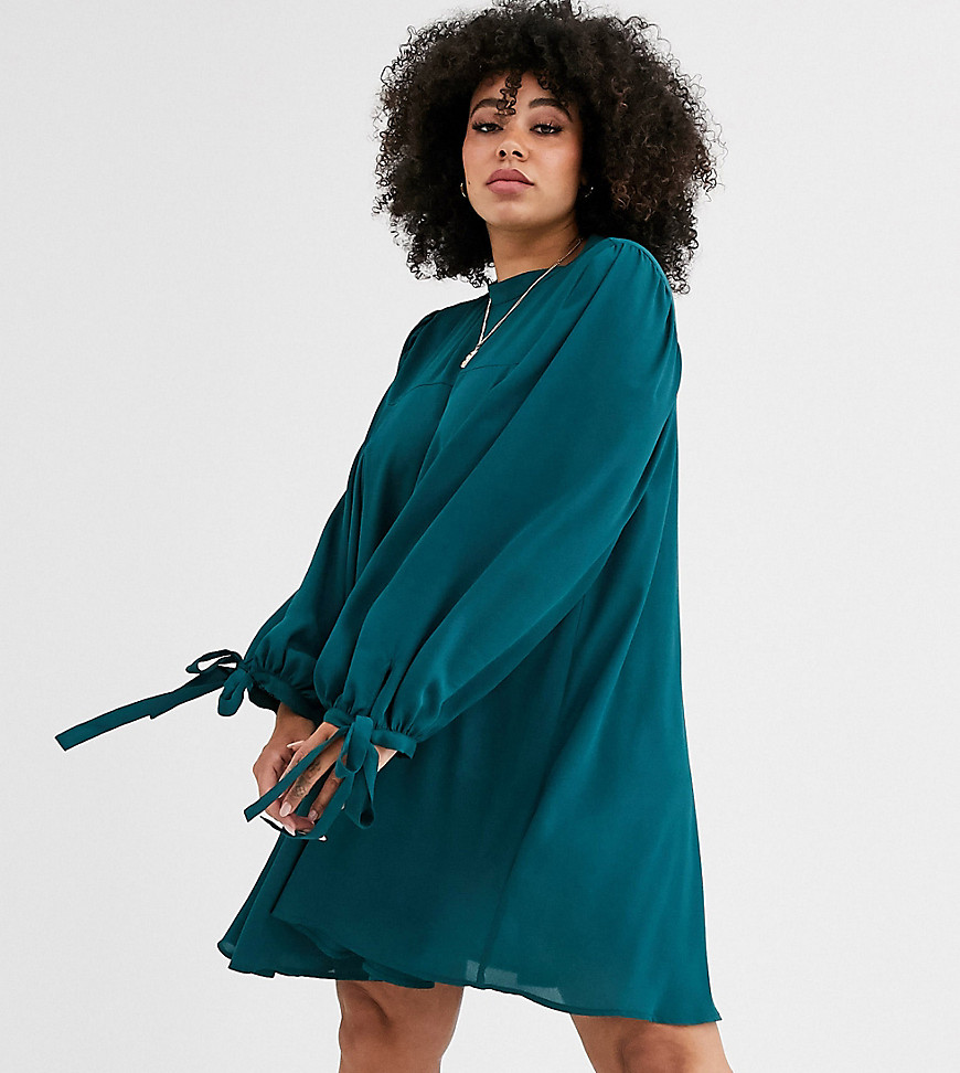 ASOS DESIGN – Curve – Vid miniklänning med hög krage och knytärm-Grön