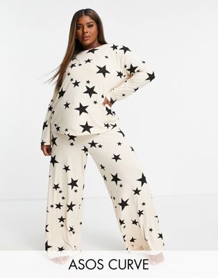 ASOS DESIGN Curve viscose star print long sleeve top & wide leg trouser pyjama set with bag in beige & black