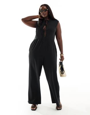 ASOS DESIGN Curve - Vorne gebundener Jumpsuit in Schwarz mit weitem Bein