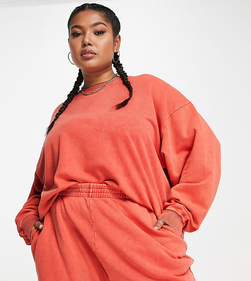 ASOS DESIGN Curve washed oversized sweatshirt in red