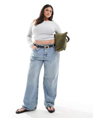 ASOS DESIGN Curve - Weite Jeans in Mittelblau mit niedrigem Bund