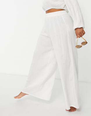 white flowy beach pants