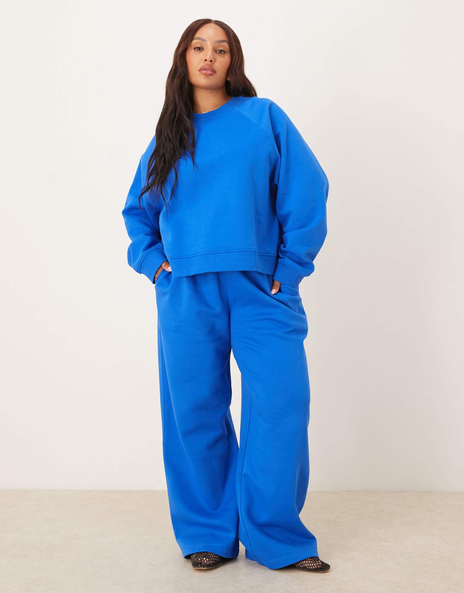 Спортивные брюки ASOS DESIGN Curve с широкими штанинами и кисточкой на спине синего цвета
