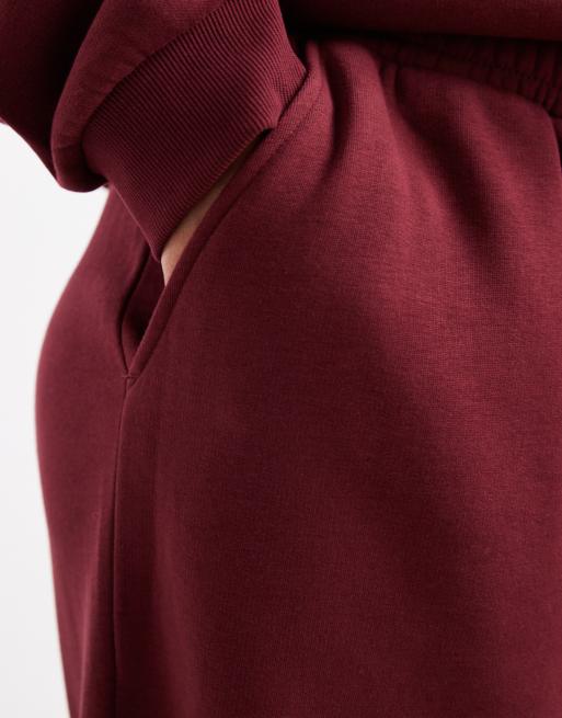ASOS DESIGN Curve wide leg brushback trackies in burgundy, 4 of 5