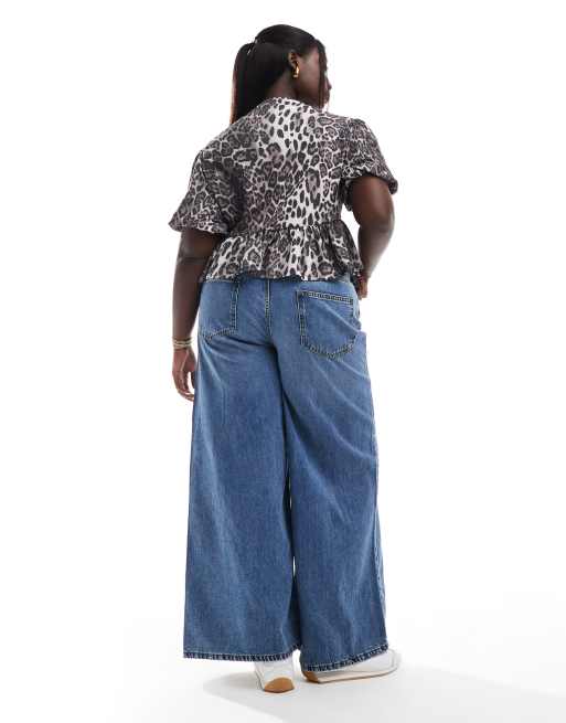 ASOS DESIGN Curve soft wide leg jean in mid blue