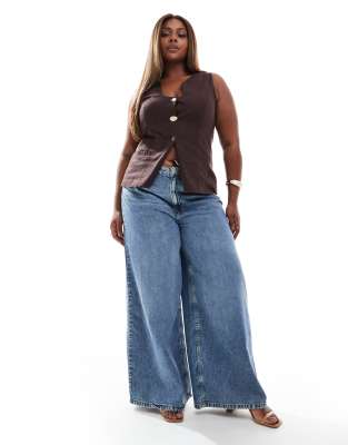 ASOS DESIGN Curve wide leg jeans in midwash blue