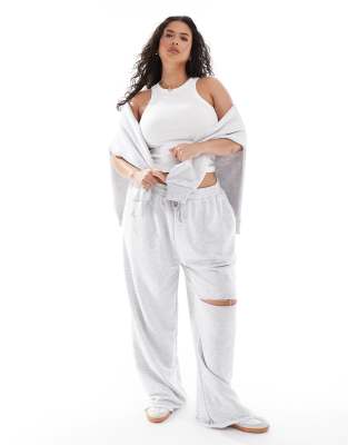 ASOS DESIGN Curve wide leg jogger with ripped knee in grey marl φωτογραφία