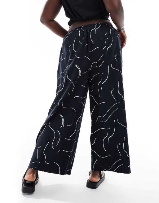 ASOS DESIGN Curve wide leg pants with linen look in mono print