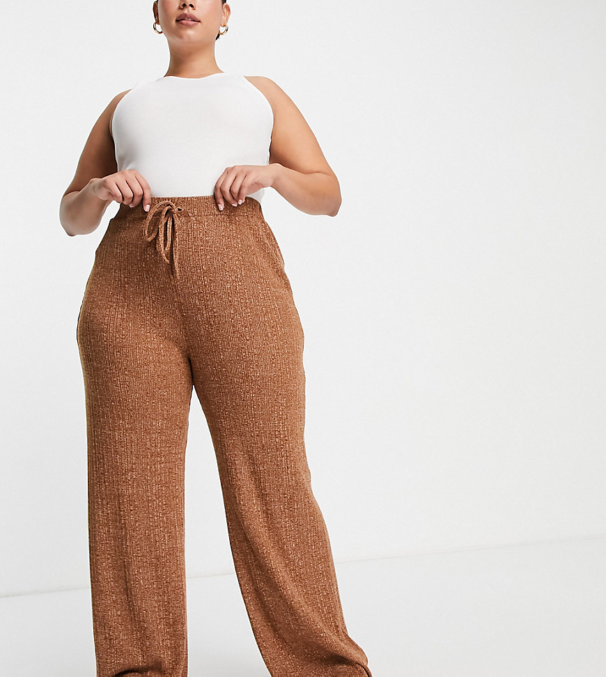 Plus-size trousers by ASOS DESIGN Comfy, meet cool High rise Elasticated waist Wide leg Regular fit