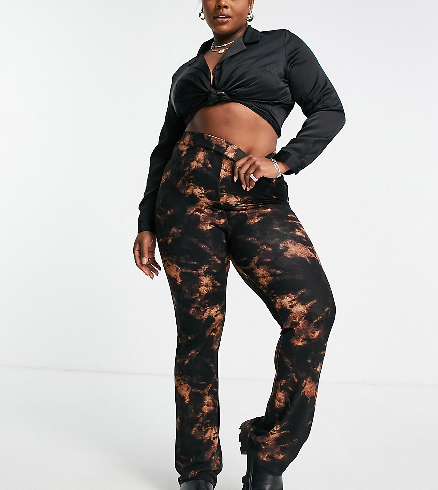 Plus-size trousers by ASOS DESIGN Gotta love tie-dye High rise Elasticated waist Flared skinny fit
