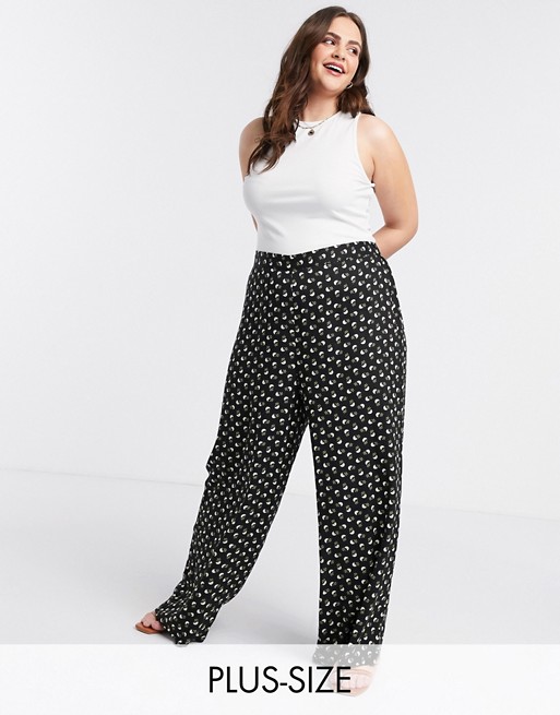 ASOS DESIGN Curve wide leg trousers in ditsy floral