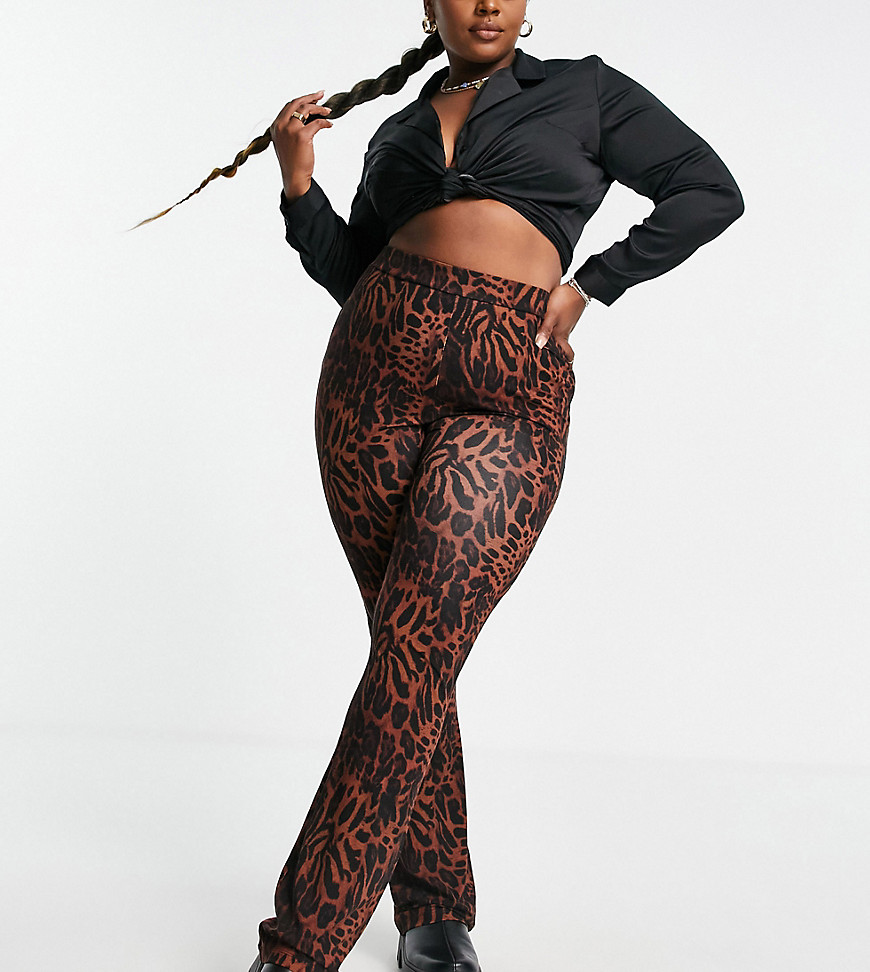 Plus-size trousers by ASOS DESIGN Gotta love leopard print High rise Elasticated waist Flared skinny fit