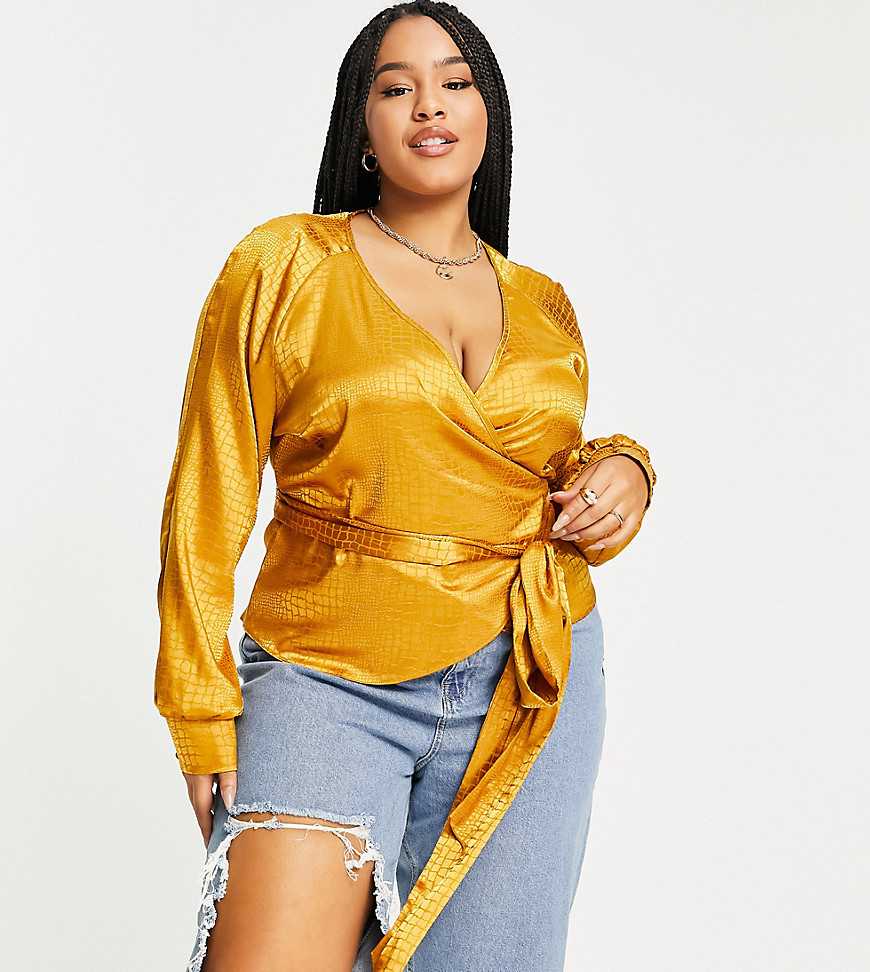Plus-size top by ASOS DESIGN Exclusive to ASOS Plunge neck Blouson sleeves Button cuffs Wrap front Regular fit