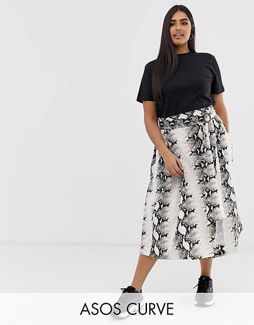 ASOS DESIGN Curve wrap midi skirt with wooden buckle and pockets in snake print
