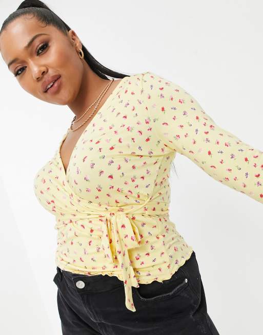 ASOS DESIGN Curve wrap top in vintage floral print in yellow