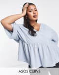 [ASOS DESIGN] ASOS DESIGN Curve wrap top with angel sleeve & peplum hem in light blue 22 Light blue