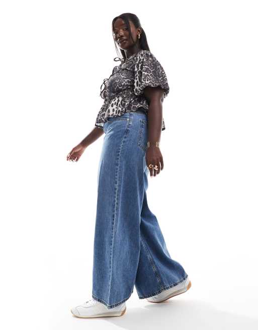 ASOS DESIGN Curve - Zachte jeans met wijde pijpen in middenblauw