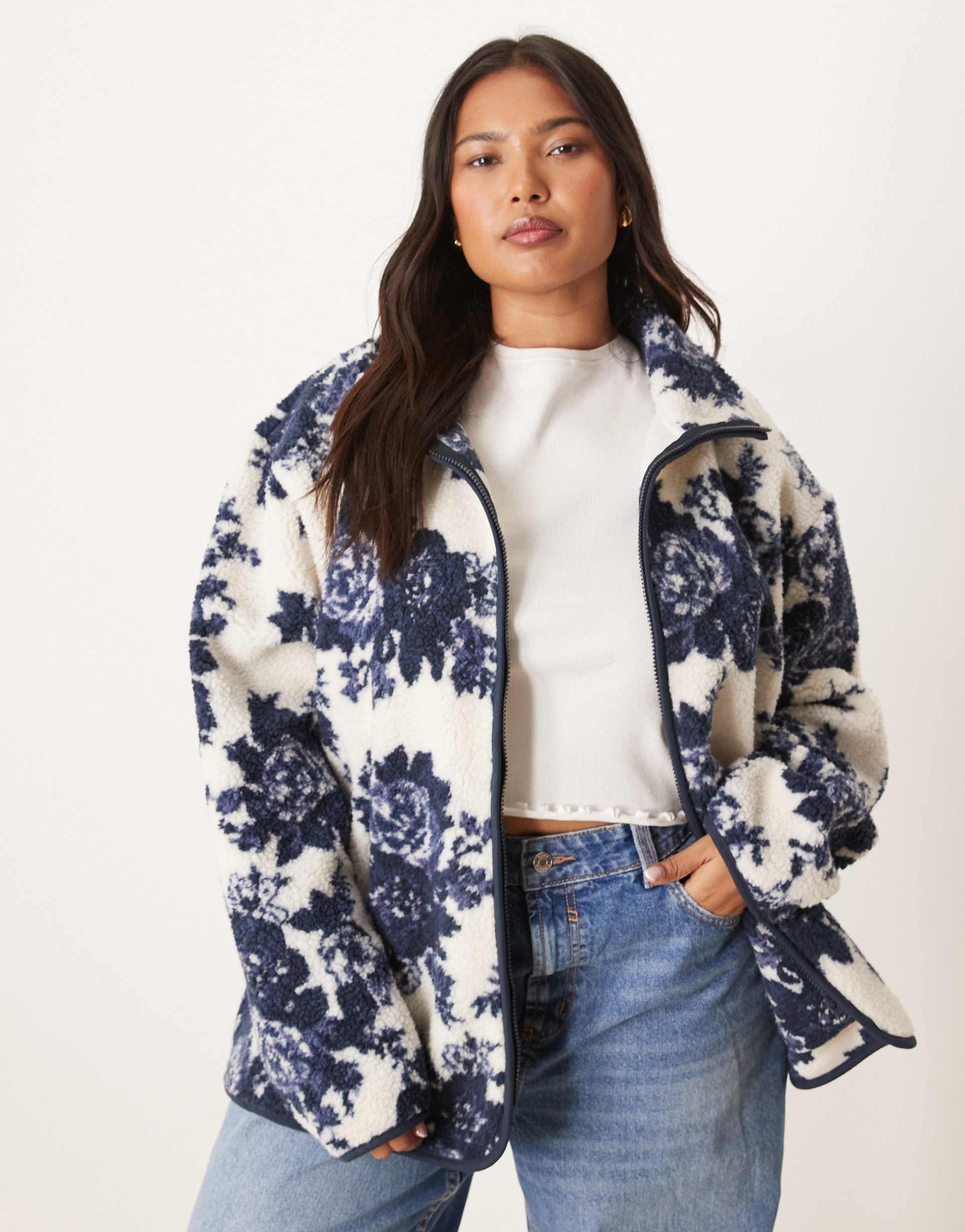 asos design curve zip up borg fleece in navy and cream floral design