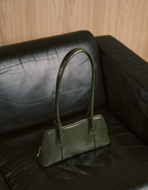 ASOS DESIGN elongated handle curved base bowler bag with seam details in olive