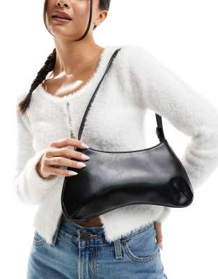 curved base skinny strap shoulder bag in black