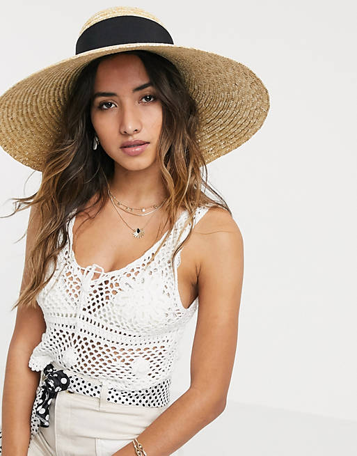 ASOS DESIGN curved crown flat brim natural straw hat with bow and size adjuster in black