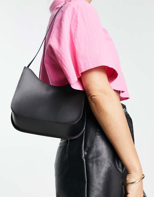 curved leather crossbody bag