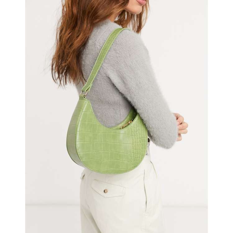 ASOS DESIGN crossbody bag with twisted top handle in green